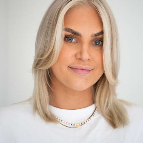 Aurora blondt hår